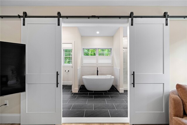1332 S Rd, South Kingstown, RI 02879 - full bathroom with baseboards, a soaking tub, recessed lighting, and tile patterned flooring