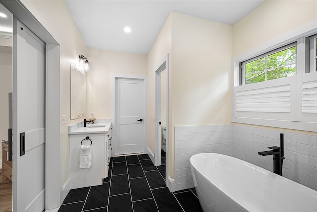 1332 S Rd, South Kingstown, RI 02879 - full bath with vanity, a soaking tub, recessed lighting, and tile patterned floors