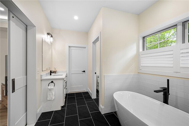 1332 S Rd, South Kingstown, RI 02879 - full bath with vanity, a soaking tub, recessed lighting, and tile patterned floors