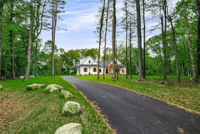 1332 S Rd, South Kingstown, RI 02879 - view of front of house featuring driveway and a front yard