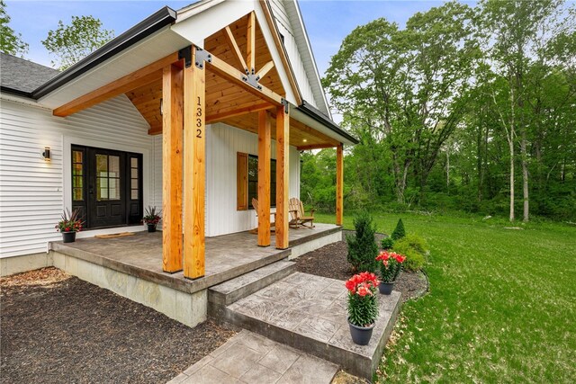 1332 S Rd, South Kingstown, RI 02879 - covered porch with a lawn