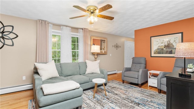 605 Gardner Rd, Exeter, RI 02822 - living area featuring a baseboard radiator, a ceiling fan, wood finished floors, and baseboards