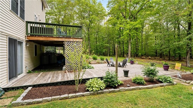 605 Gardner Rd, Exeter, RI 02822 - view of yard with a deck, a patio, and an outdoor fire pit