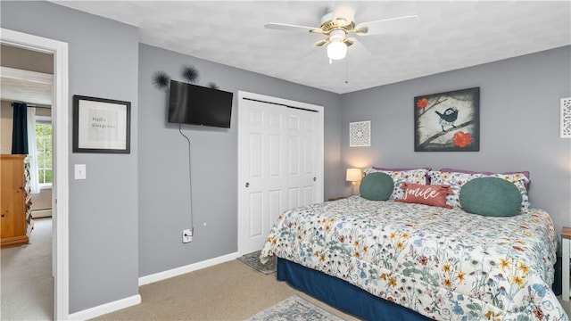 605 Gardner Rd, Exeter, RI 02822 - carpeted bedroom with baseboards, a closet, a baseboard radiator, and ceiling fan