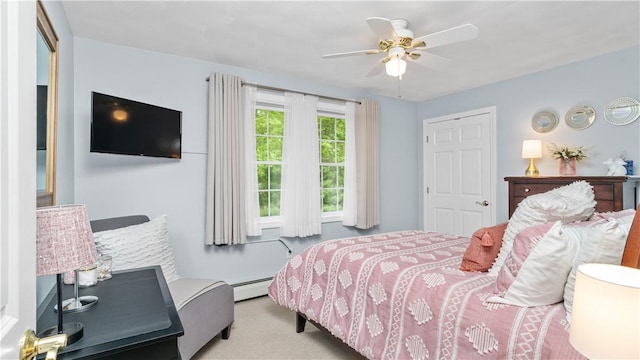 605 Gardner Rd, Exeter, RI 02822 - carpeted bedroom with a baseboard radiator and ceiling fan