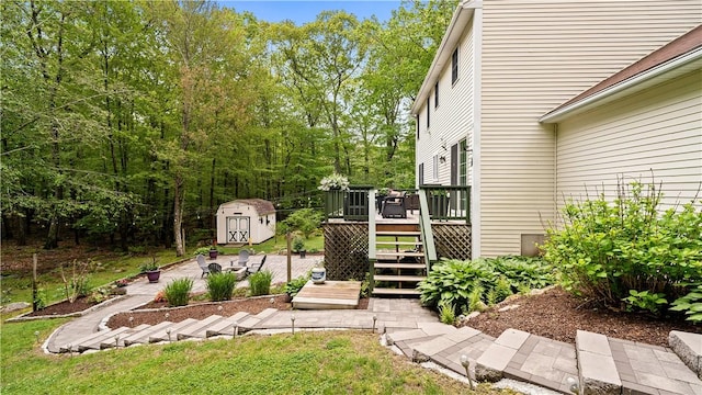 605 Gardner Rd, Exeter, RI 02822 - view of yard featuring a deck, stairs, and a patio area