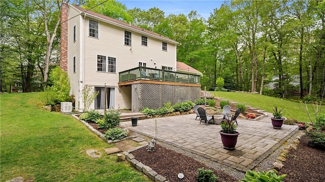 605 Gardner Rd, Exeter, RI 02822 - rear view of house featuring a patio area, a chimney, a lawn, and a deck