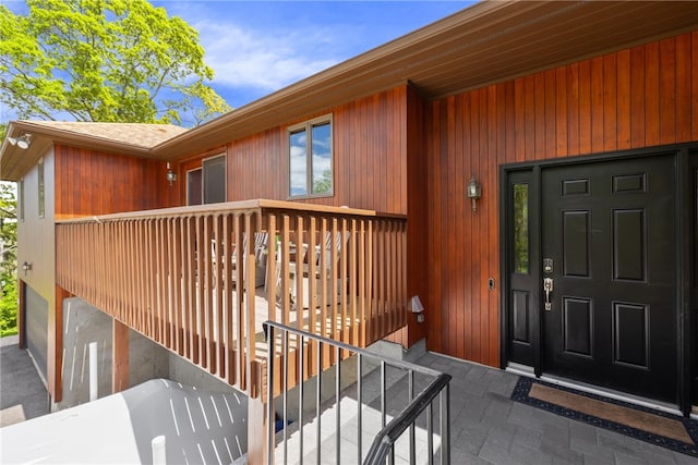 11 Cove Rd, Narragansett, RI 02882 - view of exterior entry featuring roof with shingles