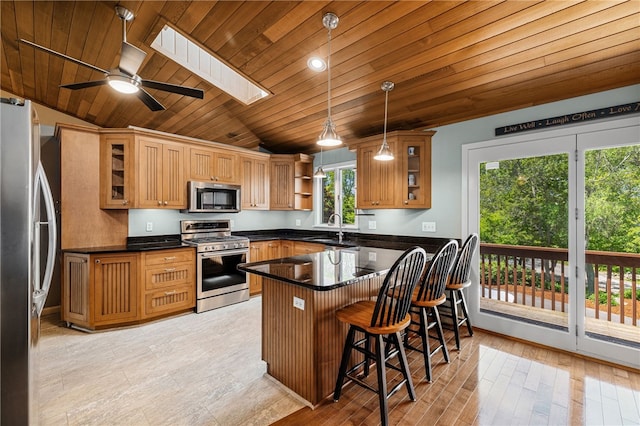 11 Cove Rd, Narragansett, RI 02882 - kitchen featuring appliances with stainless steel finishes, wood ceiling, a sink, vaulted ceiling, and open shelves