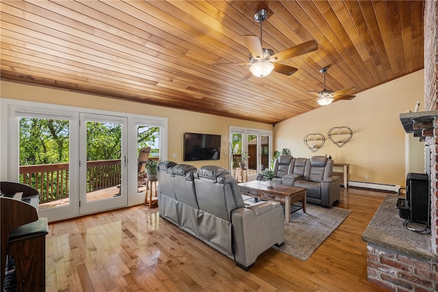 11 Cove Rd, Narragansett, RI 02882 - living room featuring baseboard heating, healthy amount of natural light, vaulted ceiling, a ceiling fan, and wooden ceiling