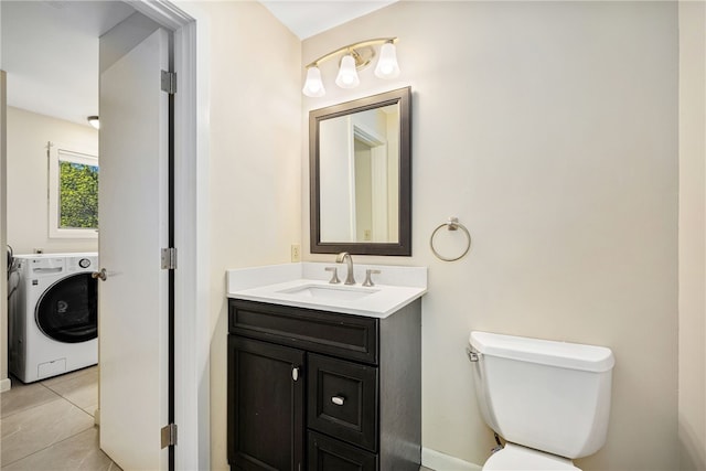 11 Cove Rd, Narragansett, RI 02882 - half bath with washer / clothes dryer, toilet, vanity, and tile patterned floors