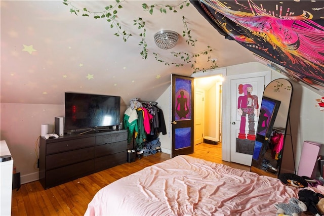 58 Edgemere Rd, Pawtucket, RI 02861 - bedroom featuring lofted ceiling, wood finished floors, and baseboards