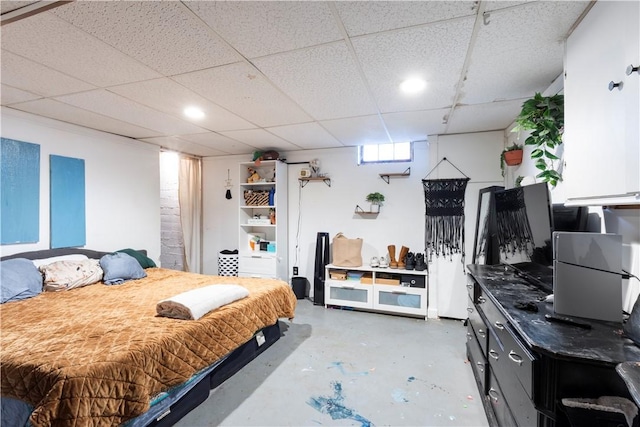 58 Edgemere Rd, Pawtucket, RI 02861 - bedroom with concrete floors and a paneled ceiling