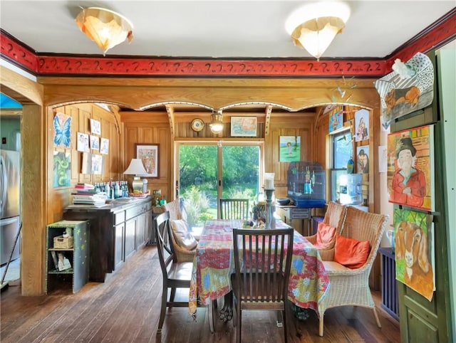219 Nanaquaket Rd, Tiverton, RI 02878 - dining area with hardwood / wood-style floors and arched walkways