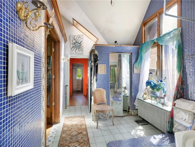 219 Nanaquaket Rd, Tiverton, RI 02878 - tiled entryway with vaulted ceiling and healthy amount of natural light