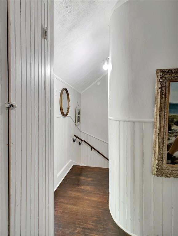 219 Nanaquaket Rd, Tiverton, RI 02878 - corridor featuring lofted ceiling, wood finished floors, a decorative wall, and crown molding