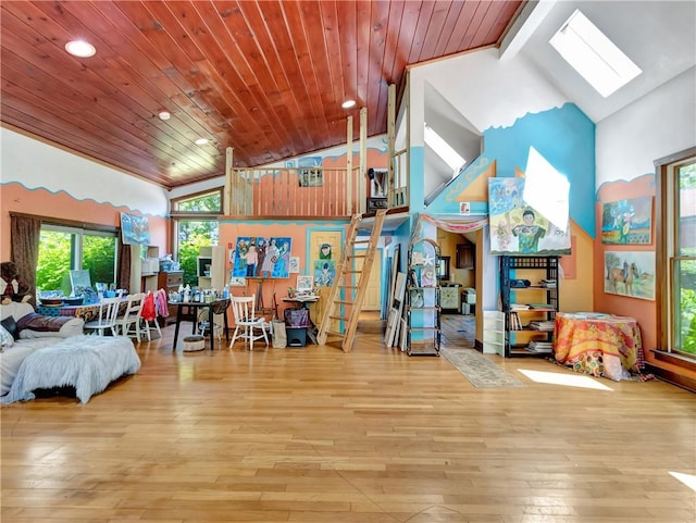 219 Nanaquaket Rd, Tiverton, RI 02878 - living area with a skylight, recessed lighting, high vaulted ceiling, hardwood / wood-style flooring, and wooden ceiling