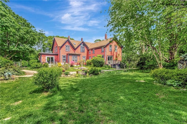 219 Nanaquaket Rd, Tiverton, RI 02878 - view of front of house featuring a front yard and a chimney