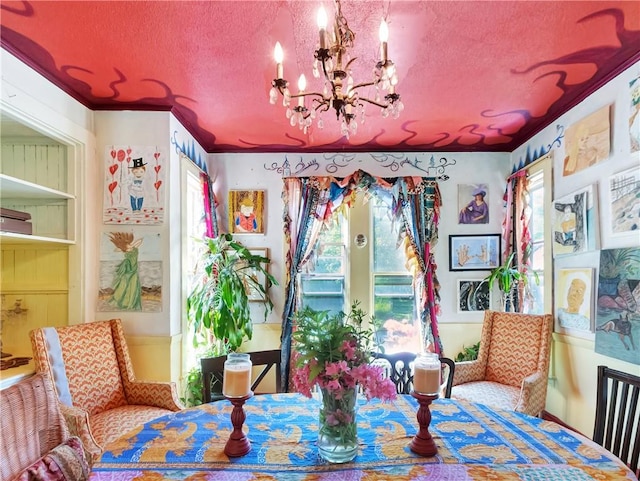 219 Nanaquaket Rd, Tiverton, RI 02878 - sitting room featuring a textured ceiling, a chandelier, and plenty of natural light