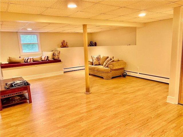 261 John Potter Rd, West Greenwich, RI 02817 - living area featuring baseboard heating, wood finished floors, recessed lighting, and a drop ceiling