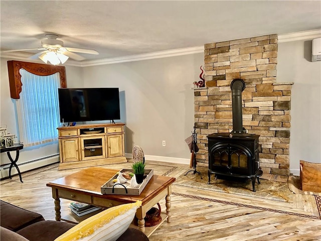 261 John Potter Rd, West Greenwich, RI 02817 - living room featuring a baseboard radiator, ceiling fan, light wood-style floors, ornamental molding, and baseboards