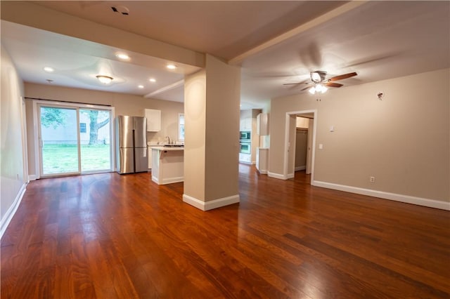 18 Railroad Ave, South Kingstown, RI 02892 - unfurnished living room featuring dark wood-type flooring, baseboards, ceiling fan, and recessed lighting
