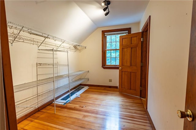 18 Railroad Ave, South Kingstown, RI 02892 - walk in closet featuring light wood finished floors and lofted ceiling