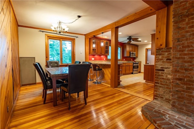 18 Railroad Ave, South Kingstown, RI 02892 - dining area featuring light wood-style floors, a chandelier, recessed lighting, crown molding, and ceiling fan