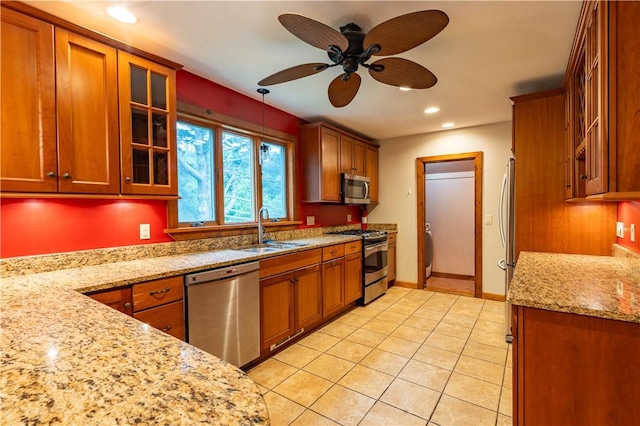 18 Railroad Ave, South Kingstown, RI 02892 - kitchen featuring appliances with stainless steel finishes, a sink, brown cabinets, recessed lighting, and a ceiling fan