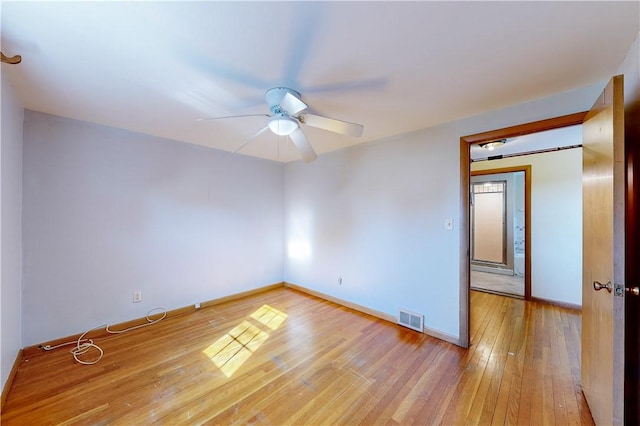 23 Sarah St, Providence, RI 02906 - empty room with a ceiling fan, light wood-style floors, and baseboards