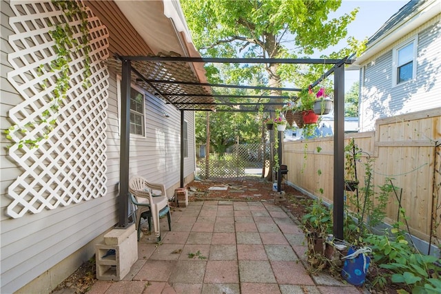 23 Sarah St, Providence, RI 02906 - fenced backyard with a pergola and a patio area