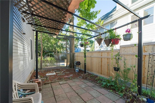 23 Sarah St, Providence, RI 02906 - fenced backyard with a pergola and a patio