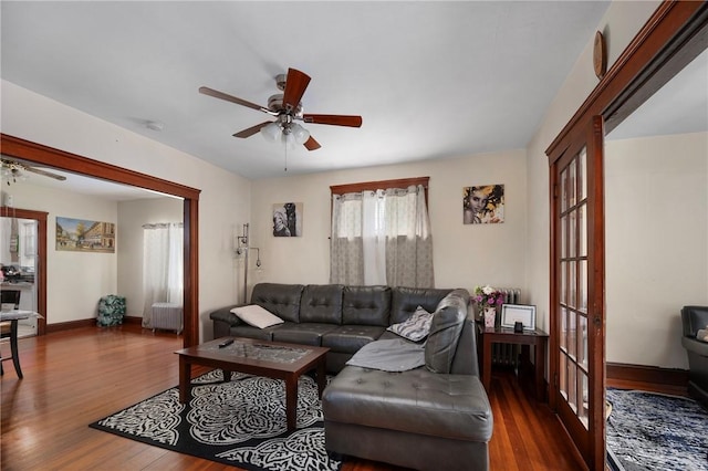 85 Englewood Ave, Pawtucket, RI 02860 - living area featuring radiator heating unit, a ceiling fan, wood finished floors, and baseboards