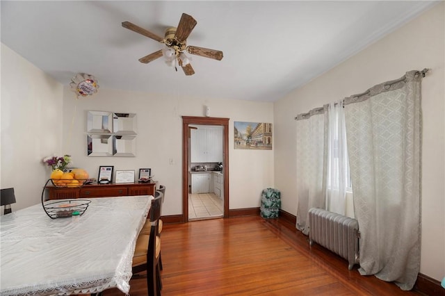 85 Englewood Ave, Pawtucket, RI 02860 - dining area featuring radiator heating unit, wood finished floors, ceiling fan, and baseboards