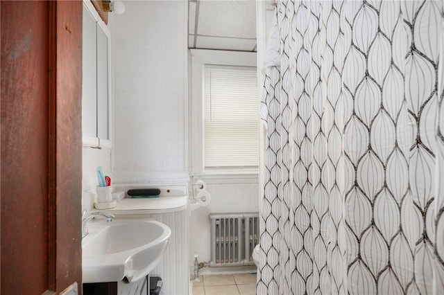 85 Englewood Ave, Pawtucket, RI 02860 - bathroom featuring radiator, a sink, tile patterned floors, and a shower with shower curtain