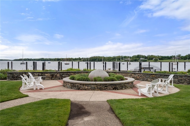 341 Thames St Unit 103, Bristol, RI 02809 - view of patio / terrace with a water view