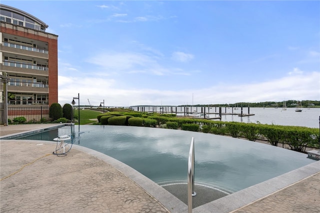341 Thames St Unit 103, Bristol, RI 02809 - view of pool featuring a water view