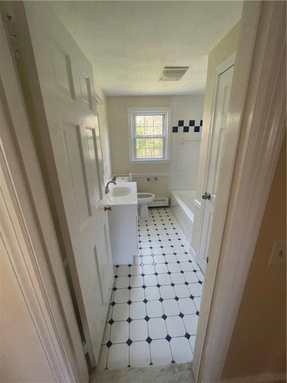 80 Frontier Rd, Warwick, RI 02889 - bathroom featuring toilet and vanity