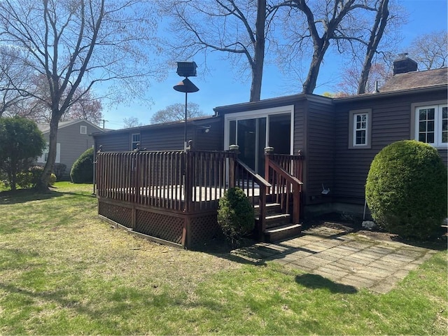 80 Frontier Rd, Warwick, RI 02889 - back of property with a yard, a wooden deck, and a chimney