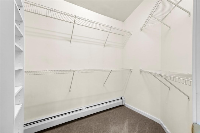 121 W Shore Dr, Exeter, RI 02822 - spacious closet with baseboard heating and dark colored carpet