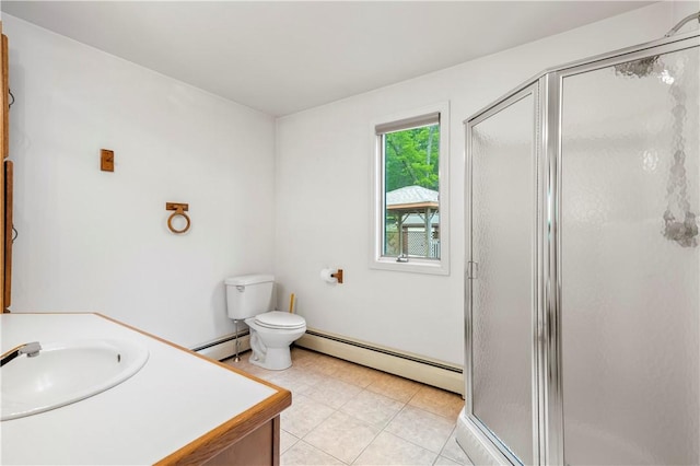 121 W Shore Dr, Exeter, RI 02822 - bathroom featuring a baseboard heating unit, a shower stall, vanity, toilet, and tile patterned flooring