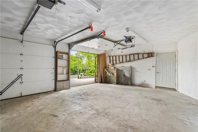 121 W Shore Dr, Exeter, RI 02822 - garage featuring a garage door opener