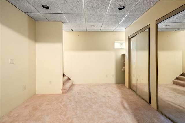 121 W Shore Dr, Exeter, RI 02822 - finished below grade area with stairs, carpet floors, and a drop ceiling