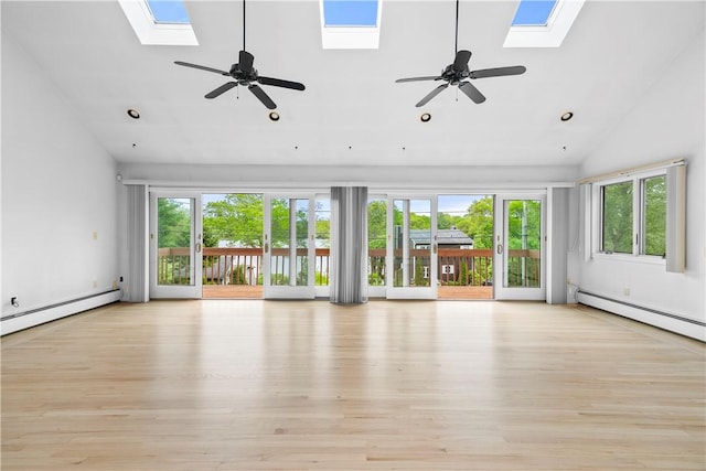 121 W Shore Dr, Exeter, RI 02822 - unfurnished living room with a skylight, high vaulted ceiling, light wood-type flooring, a baseboard heating unit, and recessed lighting