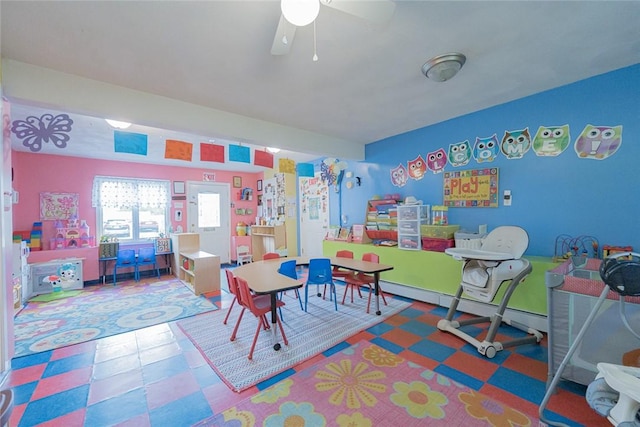 290 E View Ave, Cranston, RI 02920 - recreation room featuring tile patterned floors, ceiling fan, and a baseboard heating unit