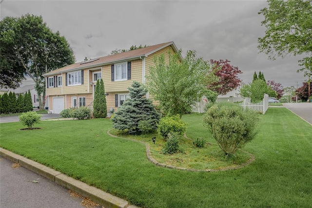 290 E View Ave, Cranston, RI 02920 - view of front of home with a garage and concrete driveway
