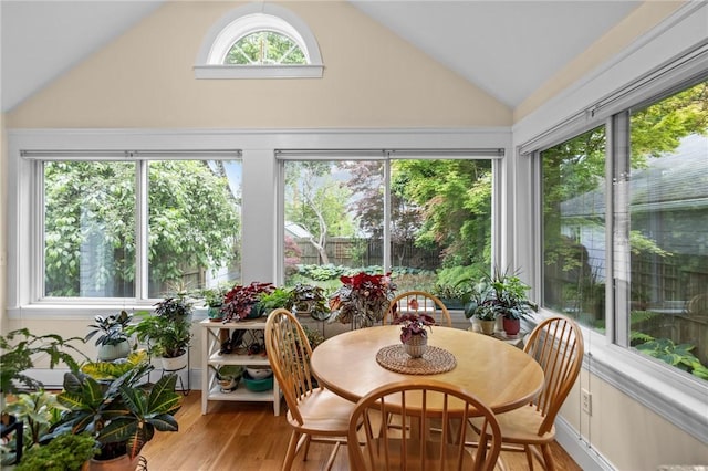 77 Friendly Rd, Cranston, RI 02910 - sunroom with lofted ceiling and wood finished floors