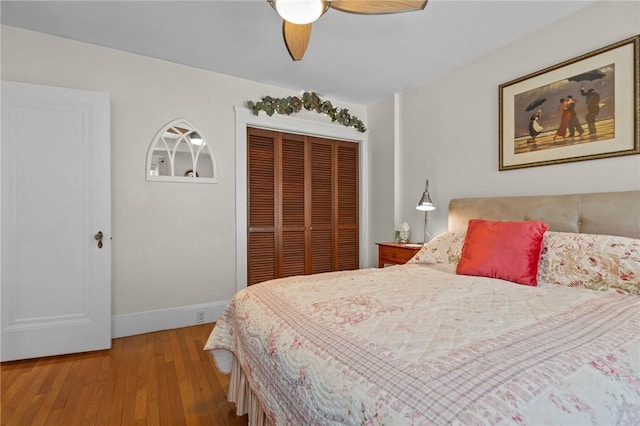 77 Friendly Rd, Cranston, RI 02910 - bedroom with a closet, hardwood / wood-style floors, baseboards, and a ceiling fan