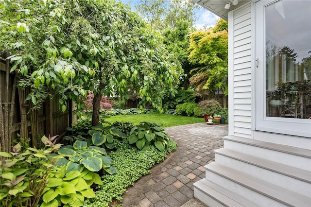 77 Friendly Rd, Cranston, RI 02910 - view of yard with entry steps and a patio area