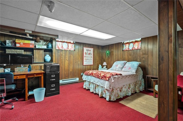 77 Friendly Rd, Cranston, RI 02910 - carpeted bedroom with baseboard heating, a drop ceiling, and wood walls